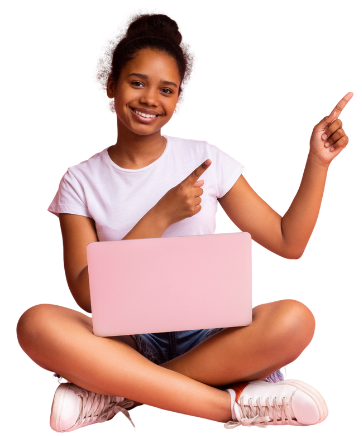young girl sat cross legged with a pink laptop pointing at the text in this article