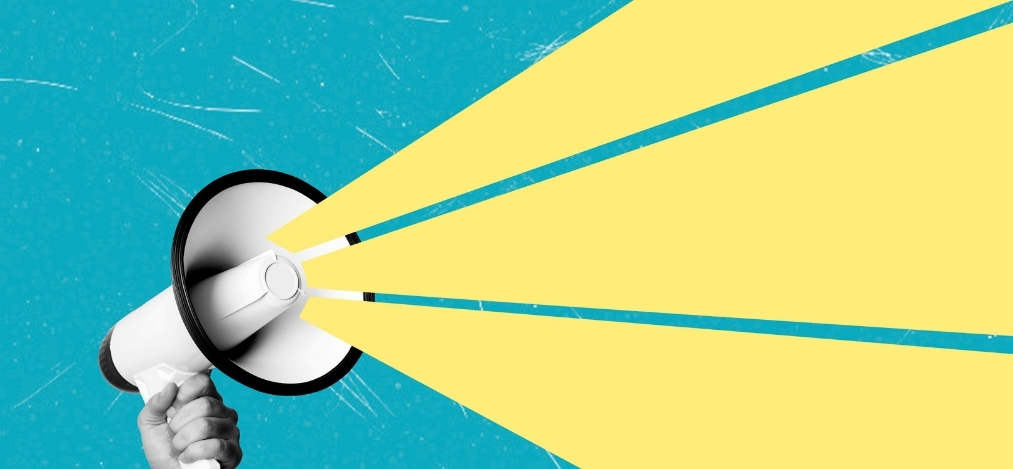 Hand holding a white megaphone emitting three yellow sound beams against a textured blue background.